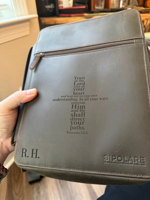 Gray leather Bible case with Proverbs 3:5-6 scripture verse and initials R.H. embossed on front