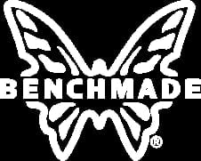 Benchmade logo featuring a stylized white butterfly wings design on black background