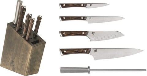 Knife block set displaying wooden block holder with five kitchen knives of varying sizes and a sharpening steel