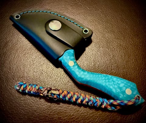 Cudeman Pyrana pocket knife with custom paracord lanyard and Spartan helmet bead